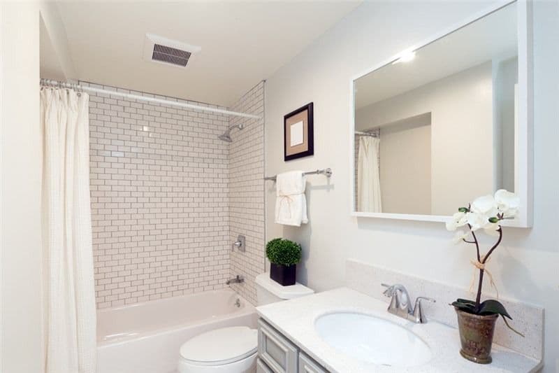 white bathroom with tile